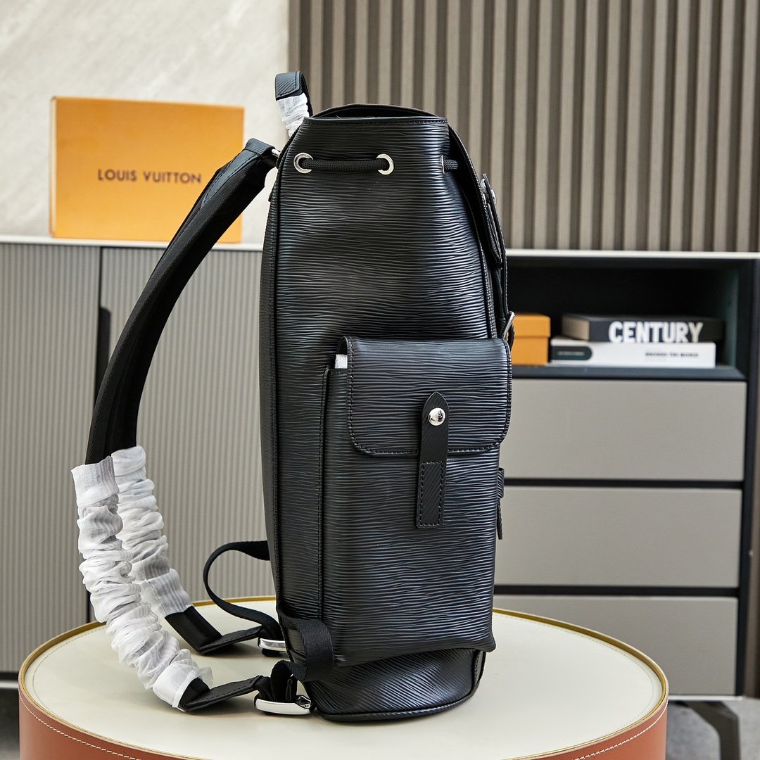 Louis Vuitton Christopher Mochila Réplica 1:1 con Cuero Auténtico y Envío Rápido 1122120460 - side view | Louis Vuitton